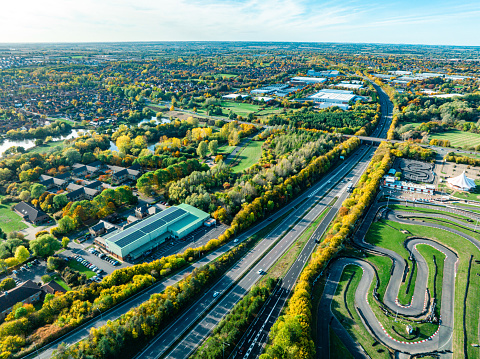 Aerial view of a train driving through at Milton Keynes Centre in UK