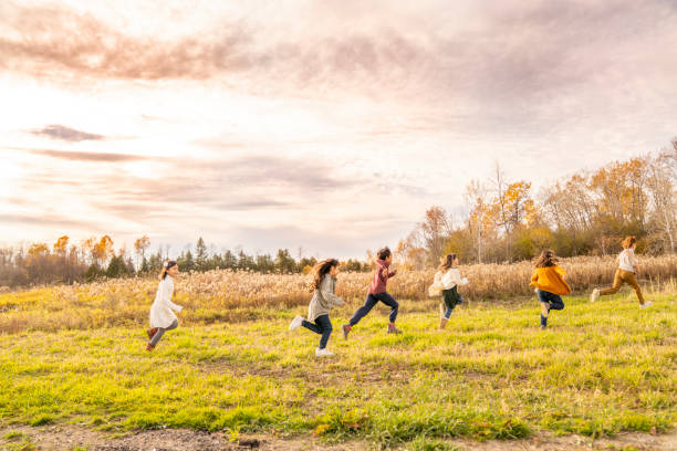 istock Children Running Across a Field 1437057629