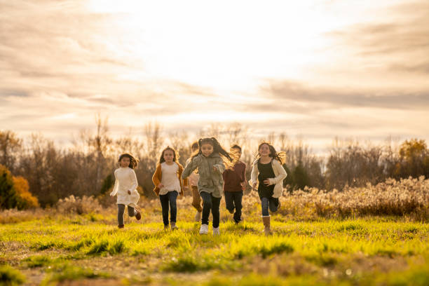 istock Children Running Towards the Camera 1437057637