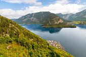 View of the town, lake and mountains of Hallstatt, Austria, from the elevated skywalk walkway above the Alpine village.