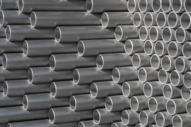 istock Silver aluminum pipe tubes stacked in a store or construction site. 1437062024
