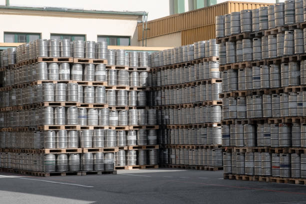 a lot of Pallets of used craft beer kegs in stock brewery a lot of Pallets of used craft beer kegs in stock brewery keg stock pictures, royalty-free photos & images