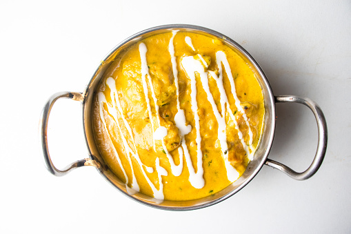 Chicken Reshmi Butter Masala karahi served in a dish isolated on grey background top view of bangladesh food