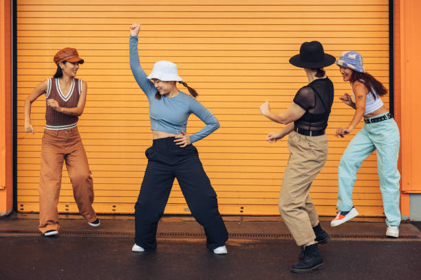 istock Four female dancers performing in the streets 1437073376