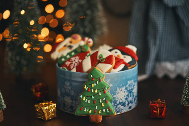 istock Decorating Gingerbread Christmas Cookies with Icing 1437074833
