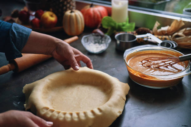 istock Preparing Pumpkin Pie for the Holidays in Domestic Kitchen 1437074859