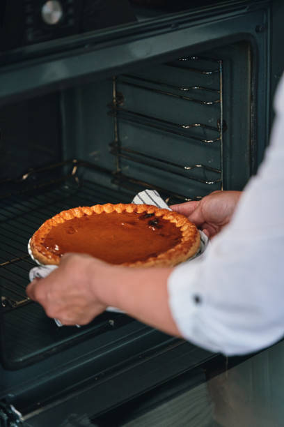 istock Preparing Pumpkin Pie for the Holidays in Domestic Kitchen 1437074863
