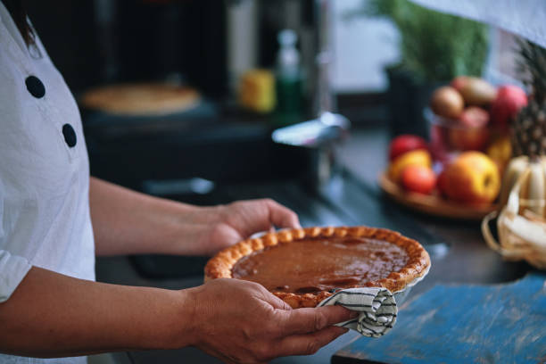 istock Preparing Pumpkin Pie for the Holidays in Domestic Kitchen 1437074870