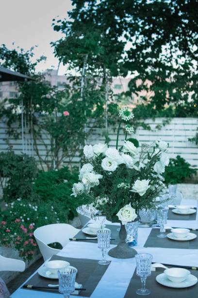 istock Vertical shot of a served table in a inner yard 1437076423