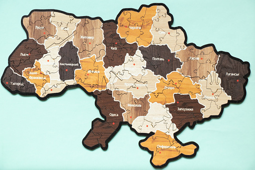 Map of Ukraine from puzzles on an isolated background close-up