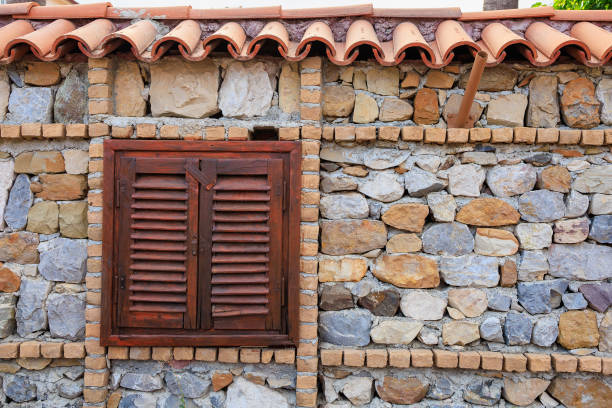 Window with closed wooden shutters. Background with copy space for text