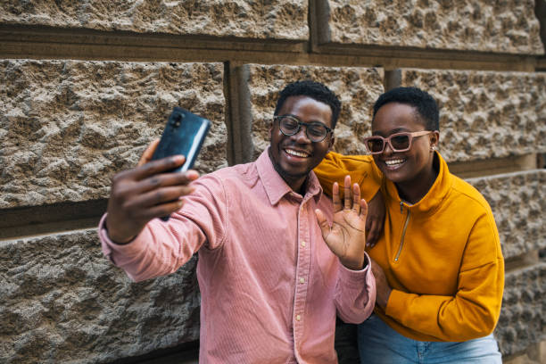 istock Young attractive black couple on a video call 1437087359