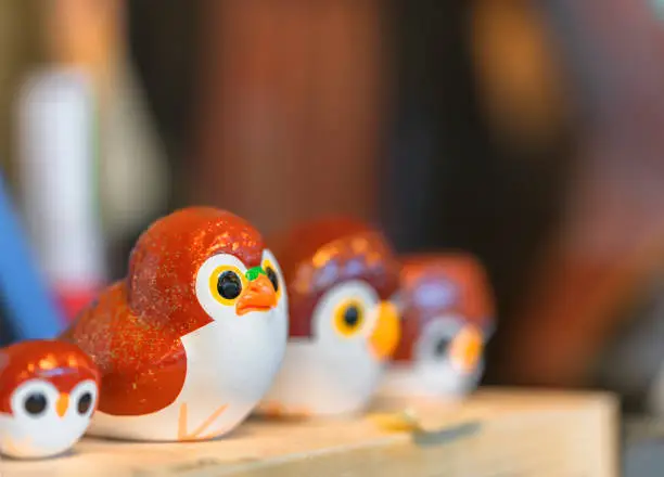 Photo of Japanese Moma whistles in the shape of a cute owl hand painted by craftman in Fukuoka.