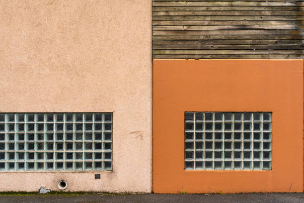 istock Industrial style building wall with windows. 1437088581