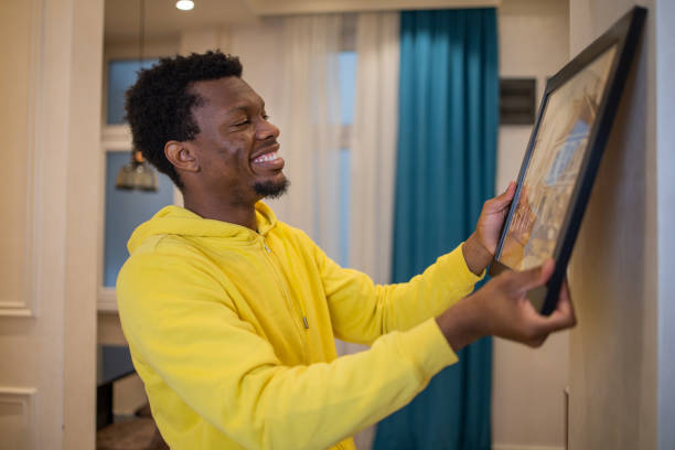 istock Young man moves into a new apartment 1437101707