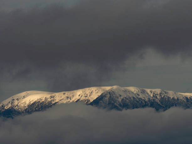 Free Stock Photo of Cloudy Sky Over Snow Covered Mountain Range ...