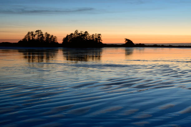 Sunset on Chesterman Beach, Tofino, Vancouver Island, BC Canada.