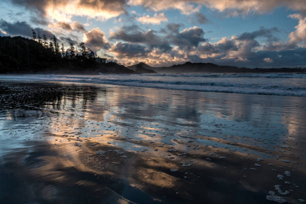 Dramatic sky on Chesterman Beach, Tofino, Vancouver Island, BC Canada