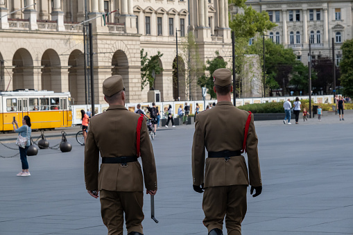 Budapest, Hungary - 1st September 2022: Back view of two Guards of honor near Hungarian Parliament Building