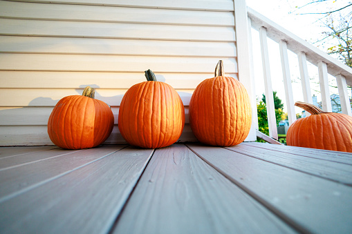 Pumpkins on Front Porch ready for Halloween and Trick or Treaters