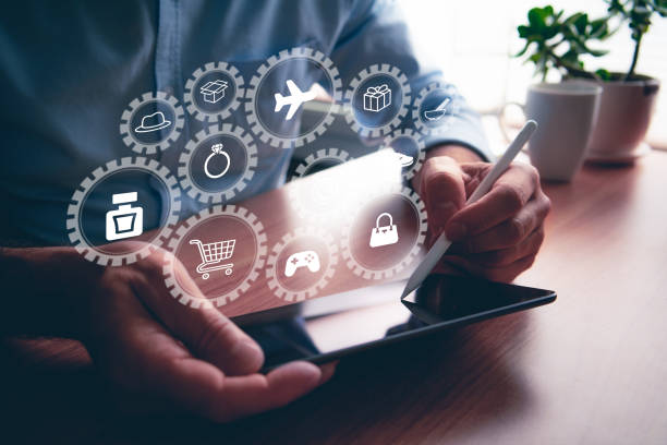 istock Man using portable table touch device with stylus. Online shopping and illustrative concept. 1437140133