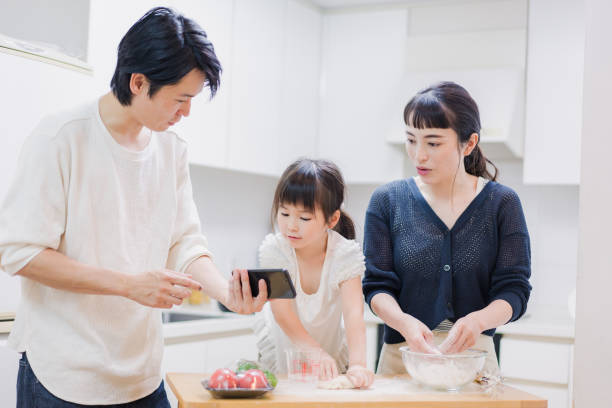 istock Families cooking while researching recipes 1437141608