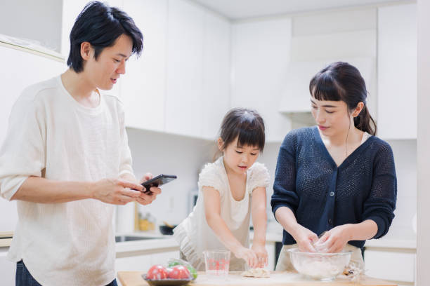 istock Families cooking while researching recipes 1437141609
