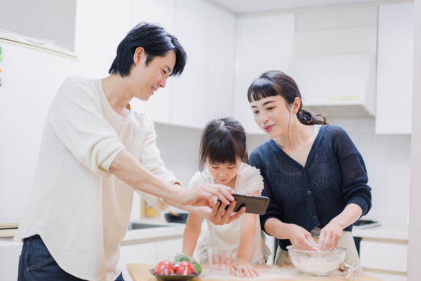 istock Families cooking while researching recipes 1437141610