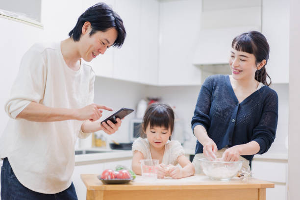istock Families cooking while researching recipes 1437141612