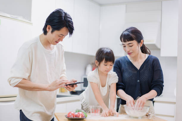 istock Families cooking while researching recipes 1437141614