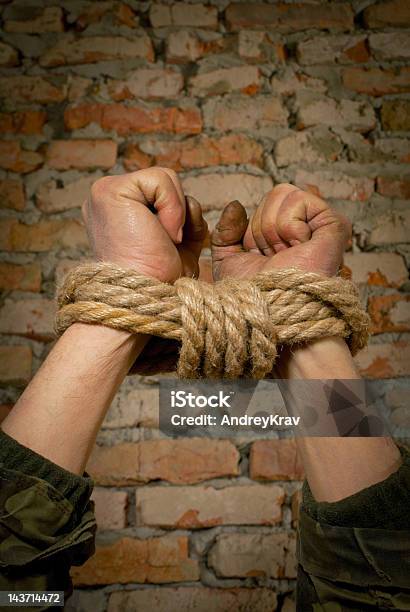 Hands Tied Up With Rope Stock Photo - Download Image Now - Brick Wall, Depression - Sadness, Forbidden