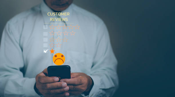 istock Client Experience dissatisfied Concept, Unhappy Businessman costomer with Sadness Emotion Face on smartphone screen, Bad review,  service is not good,  bad quality, low rating, social media not like. 1437152268