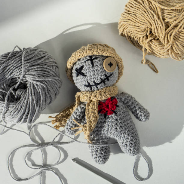 istock A toy for kids. There are threads, needles, a hook, cotton yarn on the table. 1437153074