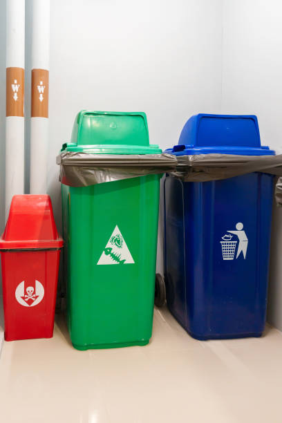 istock Colorful trash dustbin, Red, green, blue and yellow bin for Hazardous, Biodegradable, General and Recyclable waste. recycling management, waste segregation, garbage and rubbish concept 1437153559