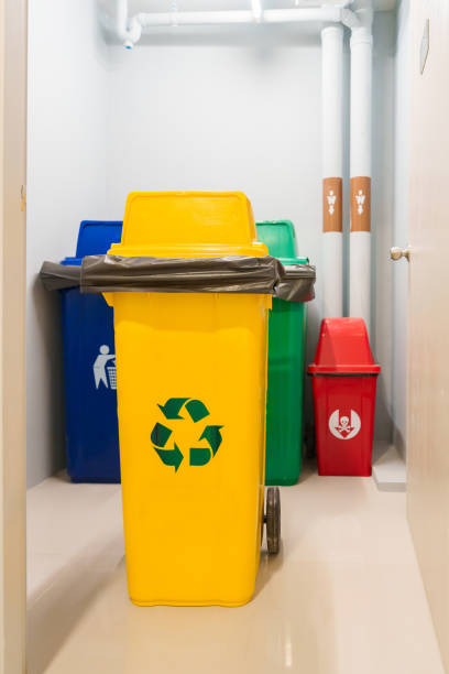 istock Yellow trash dustbin for Recyclable waste and Red, green and blue for Hazardous, Biodegradable and General waste. recycling management, waste segregation, garbage and rubbish concept 1437153568