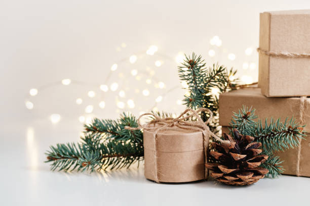istock Christmas sustainable gift boxes composition with natural decor. Christmas zero waste, boxing day and winter holiday 1437157000
