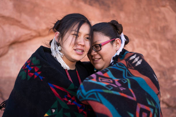 istock Navajo sisters embracing 1437158124