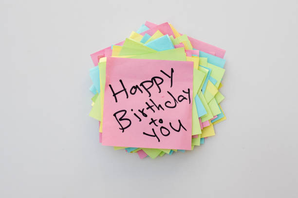 istock Happy birthday to you hand written note on a sticky note pad 1437165846
