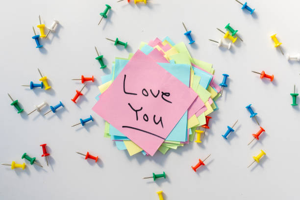 istock Love you postcard handwritten on a sticky note 1437166460