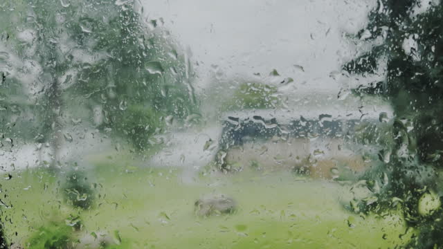 Patio View of Rare Summer Torrential Rain Looking Outdoors at Downpour from Domestic Room Video Series