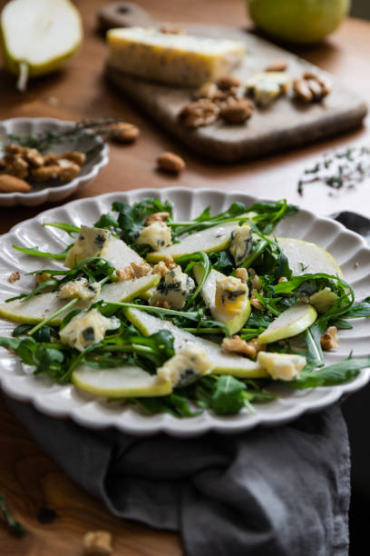 istock Healthy salad with pears, arugula, walnut and blue cheese. 1437168859