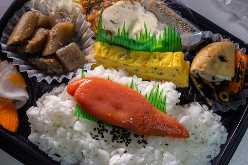 Mentaiko with a bento box. Mentaiko is the traditional Japanese food made by tarako (salted cod or pollack roe) with mixture of red pepper, dashi sauce, and other ingredients