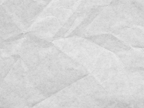 White crumpled parchment paper texture background
