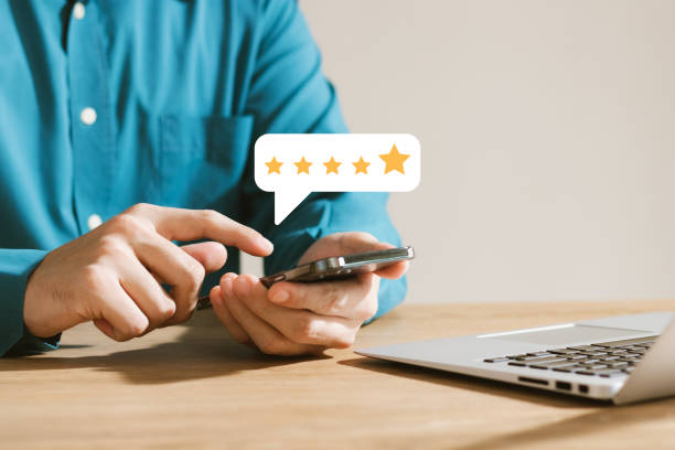 istock User give rating to service experience on online application, Customer review satisfaction feedback survey concept, Customer can evaluate quality of service leading to reputation ranking of business. 1437174953