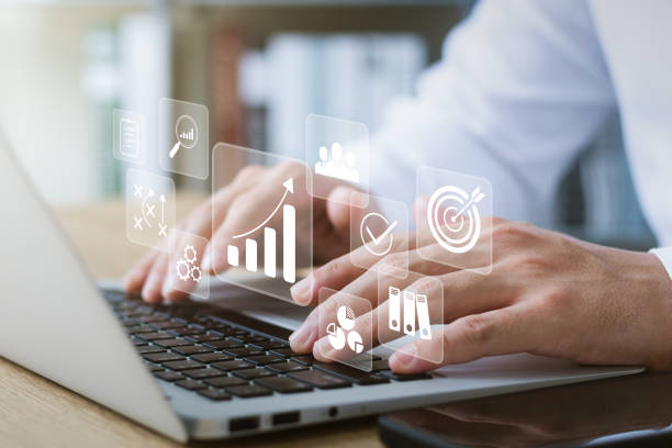 istock concept of long-term business development and management Executives looking at virtual screens business graph icon Goal setting, problem-solving, workflows, optimal business operations and innovation. 1437174977