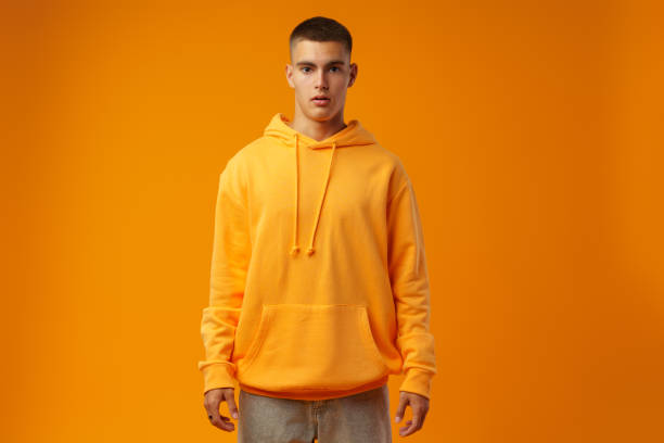 istock Young handsome man shocked with surprise expression standing over yellow background 1437178209