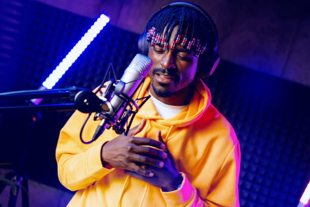 istock Young African performer recording his new track in recording studio 1437182166