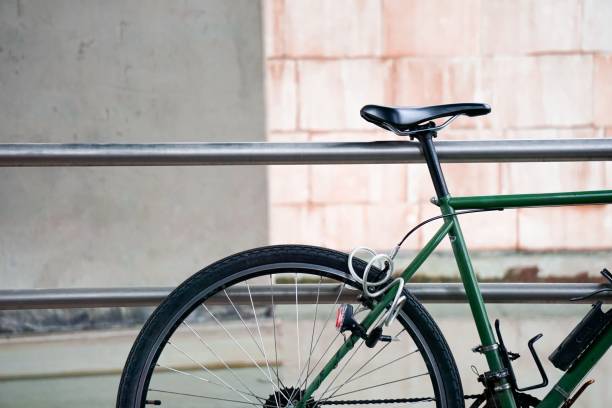 istock Parked bicycle on the background of brick wall 1437183656