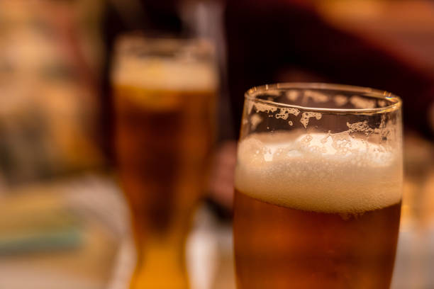 istock Fresh cold glass of light beer in restaurant 1437184082
