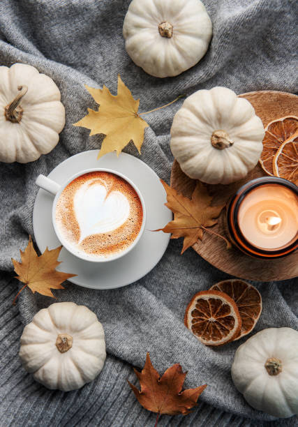 istock White pumpkins, coffee and autumn leaves 1437189394